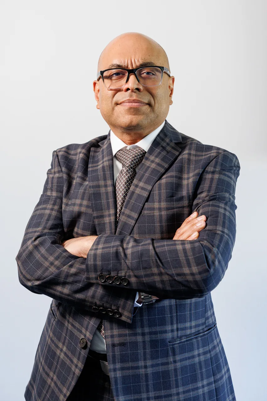Mr Amit Shah, Consultant Orthopaedic Surgeon, in a suit